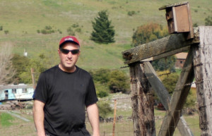 Mike Azevedo near one of his nest boxes at Ed Levin County Park. Photo courtesy of Mike Azevedo.