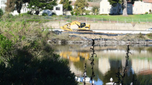 Workers are setting up to begin dredging Mountain Lake between March and October to remove 15,600 cubic yards of sediment from its bottom.  Photo: Dhyana Levey.