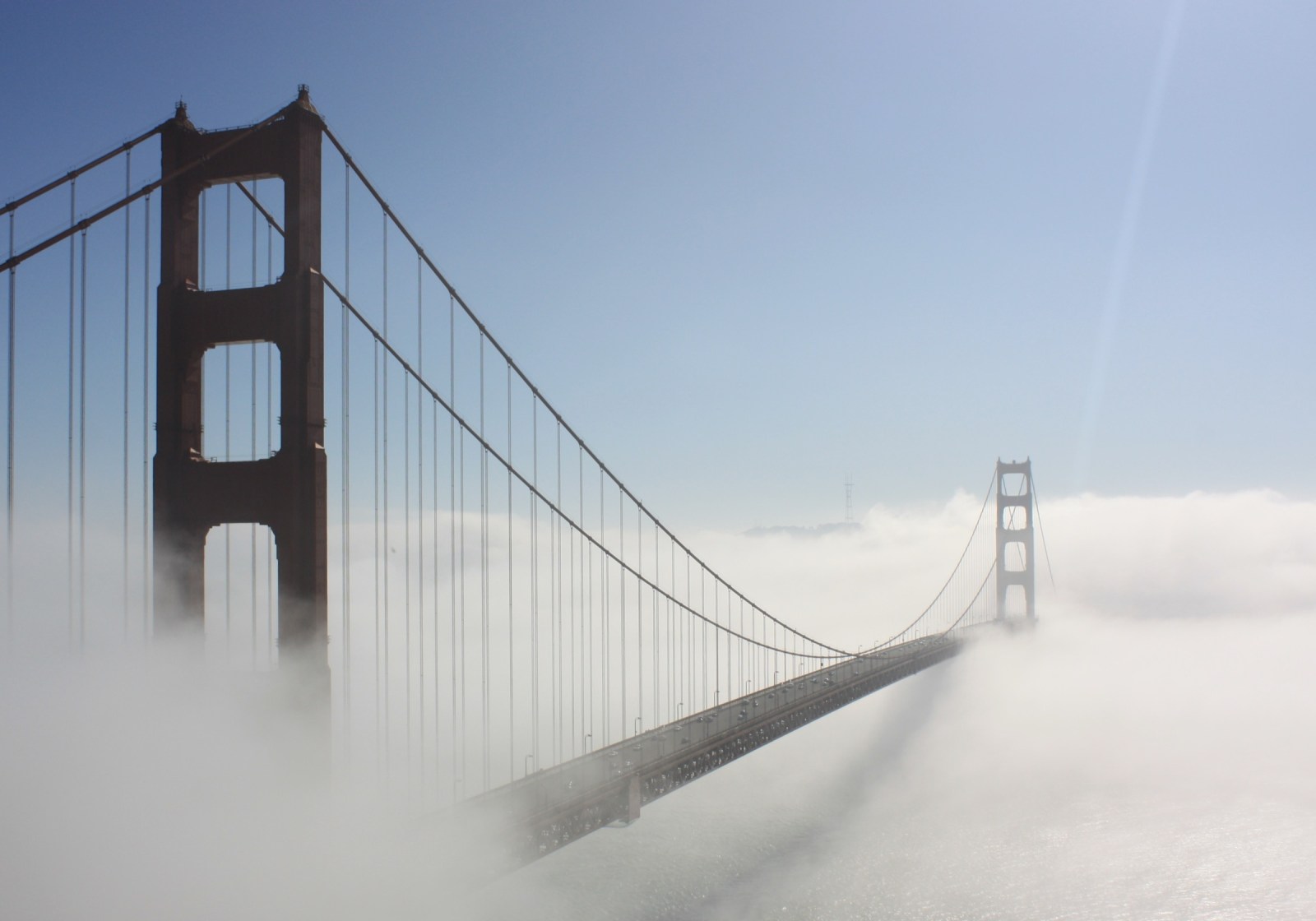 Fog envelops the Golden Gate Bridge.