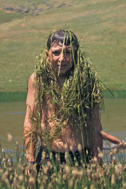 James Wilson as a boy, in a pond