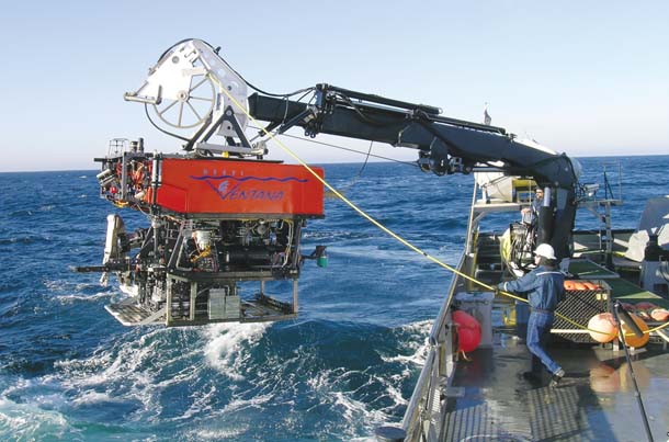 MBARI technicians launch a remotely operated vehicle named Ventana to study the deep sea conditions in Monterey Canyon. Photo by Kim Fulton-Bennett, (c) 2004 MBARI