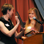 Board member Nancy Westcott presents Youth Engagement Award to Cheyanna Washburn