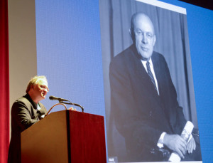 North Dakota State Professor Mark Harvey speaks while displaying a photo of Howard Zahniser, the first executive secretary of the Wilderness Society. (Photo by Dave Reider)