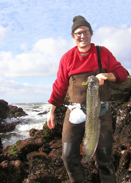 Kirk Lombard with his Record-Setting Monkeyface Eel. Photo Credit: Kirk Lombard