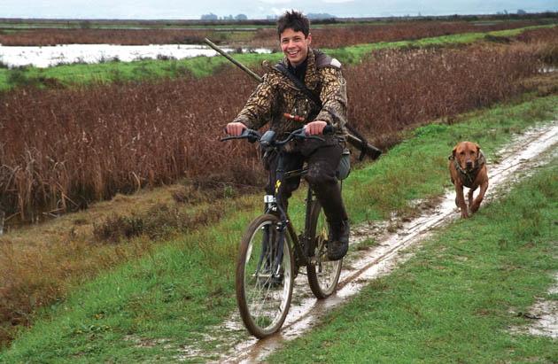 hunter on bicycle