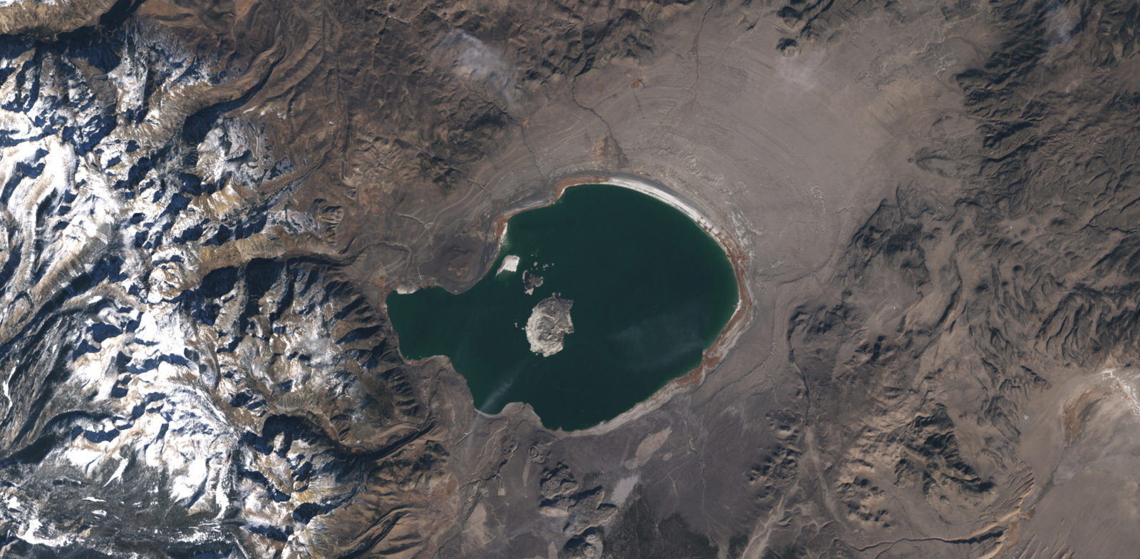 Mono Lake sits in eastern California along the edge of the Great Basin, one of North America's four largest deserts. (NASA photo)