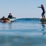 three black girls surfing